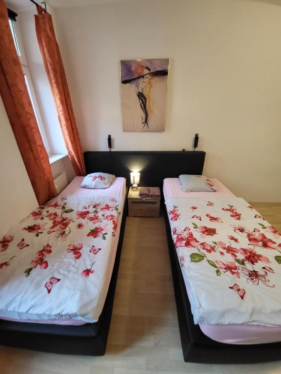 Postel nebo postele na pokoji v ubytování Apartmentzimmer