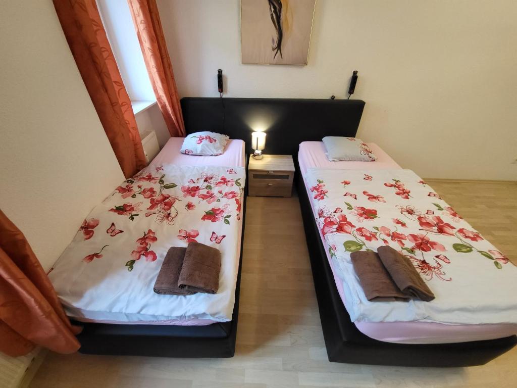 Postel nebo postele na pokoji v ubytování Apartmentzimmer
