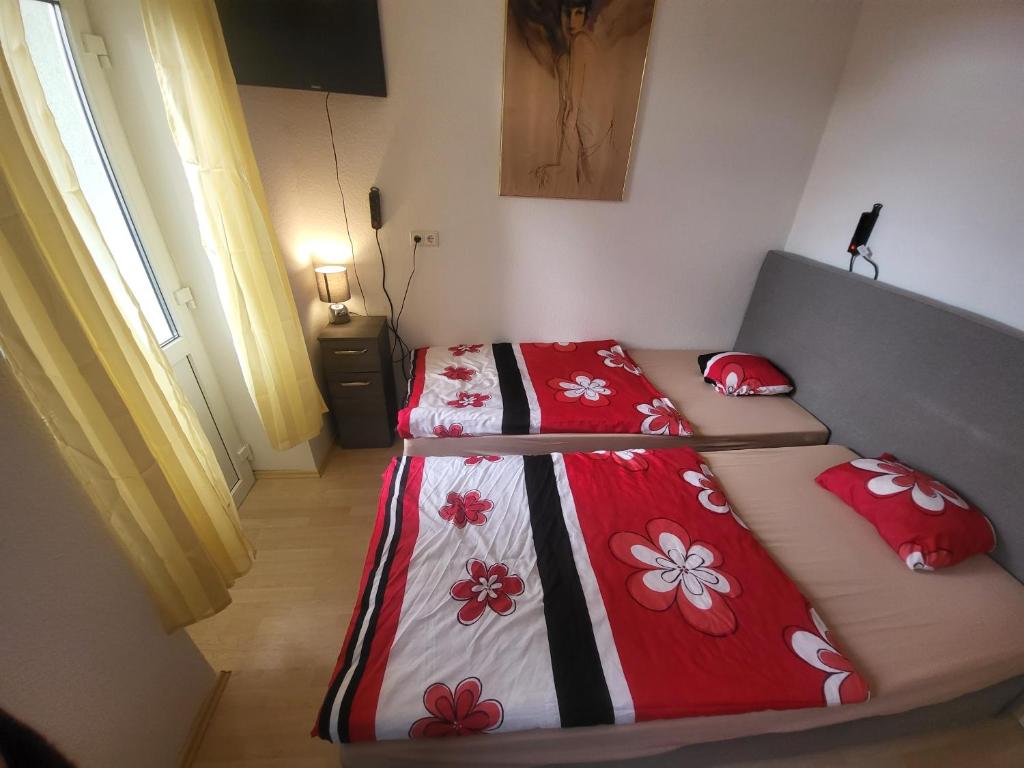 Postel nebo postele na pokoji v ubytování Apartmentzimmer