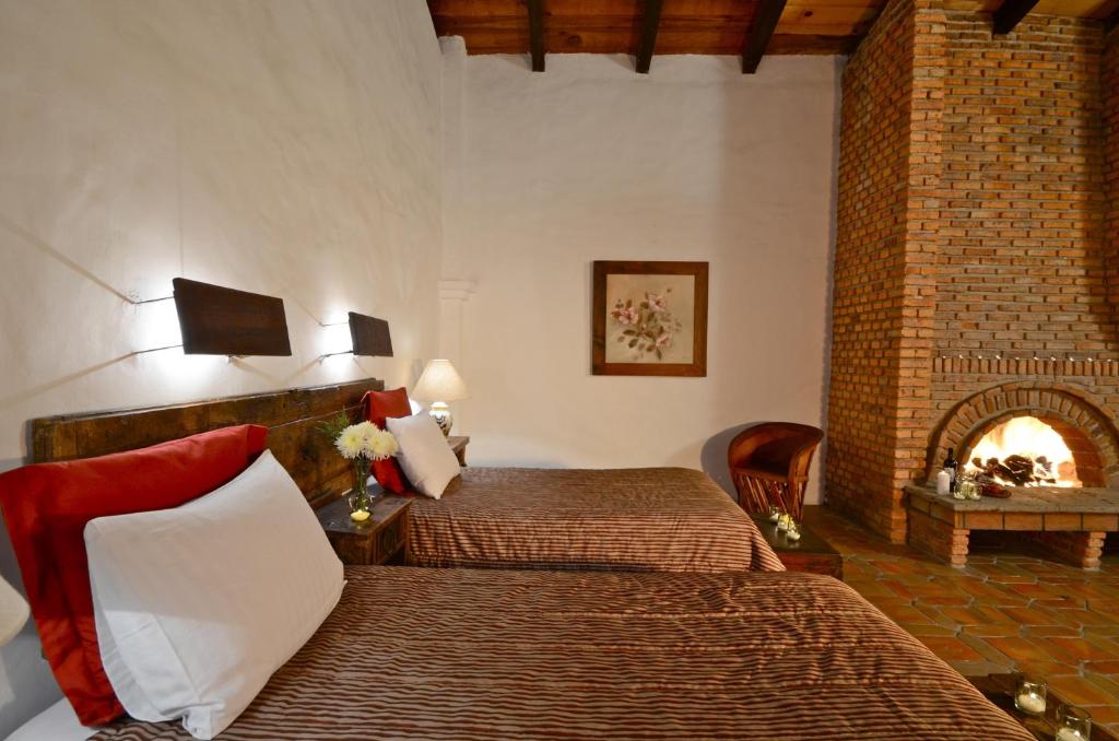 Postel nebo postele na pokoji v ubytování Villas Danza del Sol