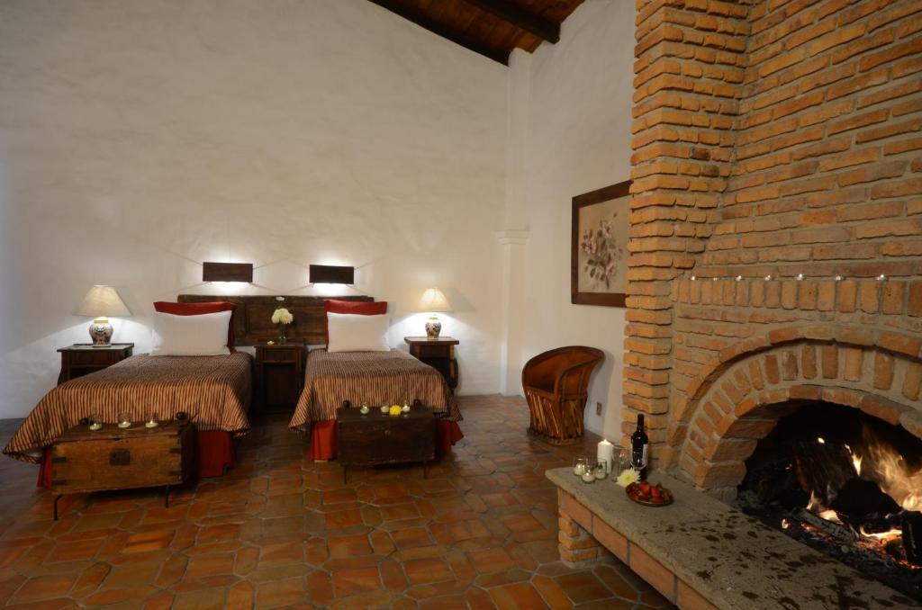 Postel nebo postele na pokoji v ubytování Villas Danza del Sol