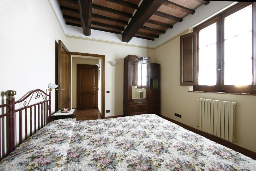 Postel nebo postele na pokoji v ubytování Agriturismo Sanguineto