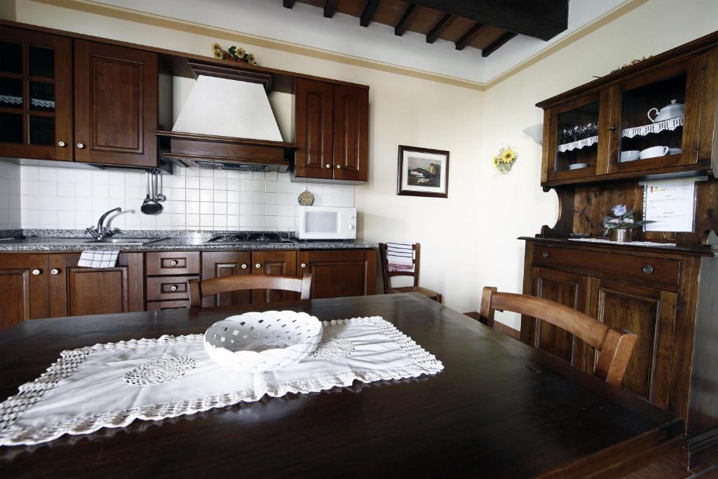 Kuchyň nebo kuchyňský kout v ubytování Agriturismo Sanguineto