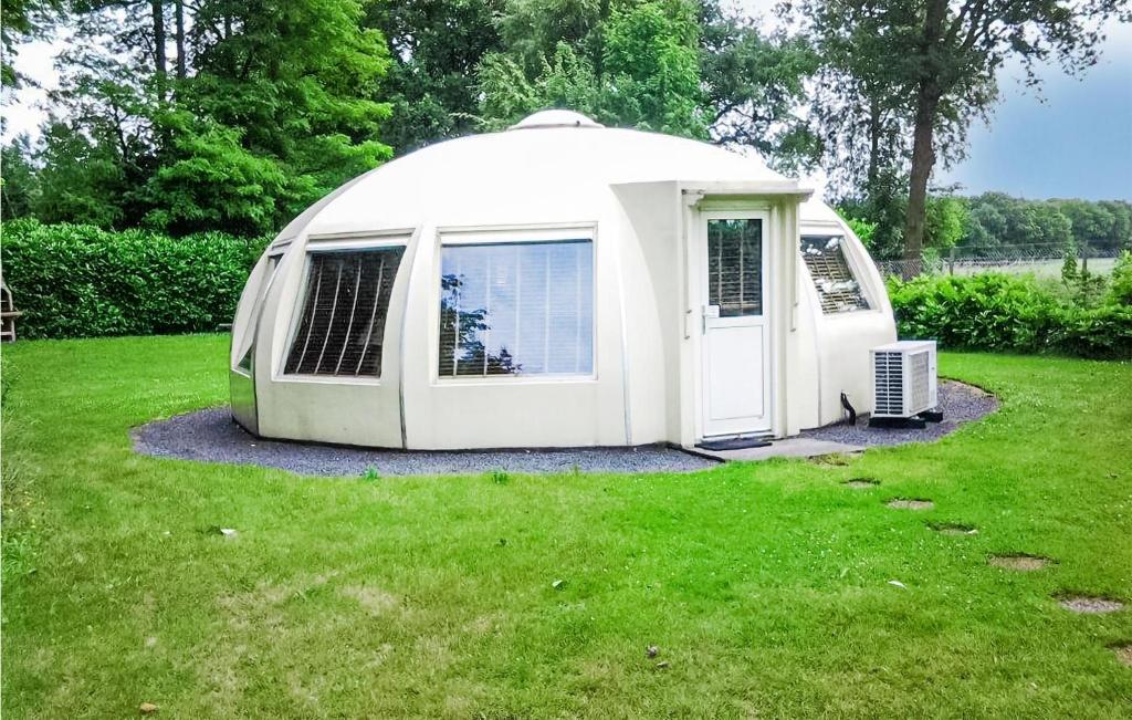 a white dome tent in a field of grass at Beautiful Home In Chaam With Wifi in Chaam