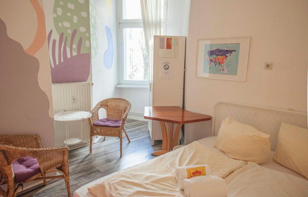 Postel nebo postele na pokoji v ubytování BackpackerBerlin