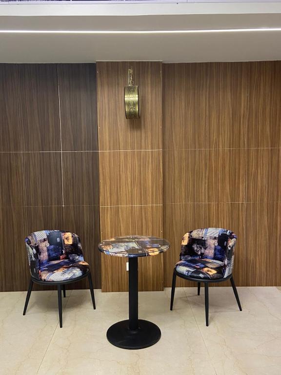 Posezení v ubytování Le Shiv Executive Suite