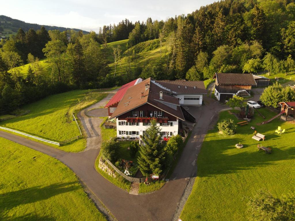 an aerial view of a house in the mountains at Gsolhof in Rettenberg