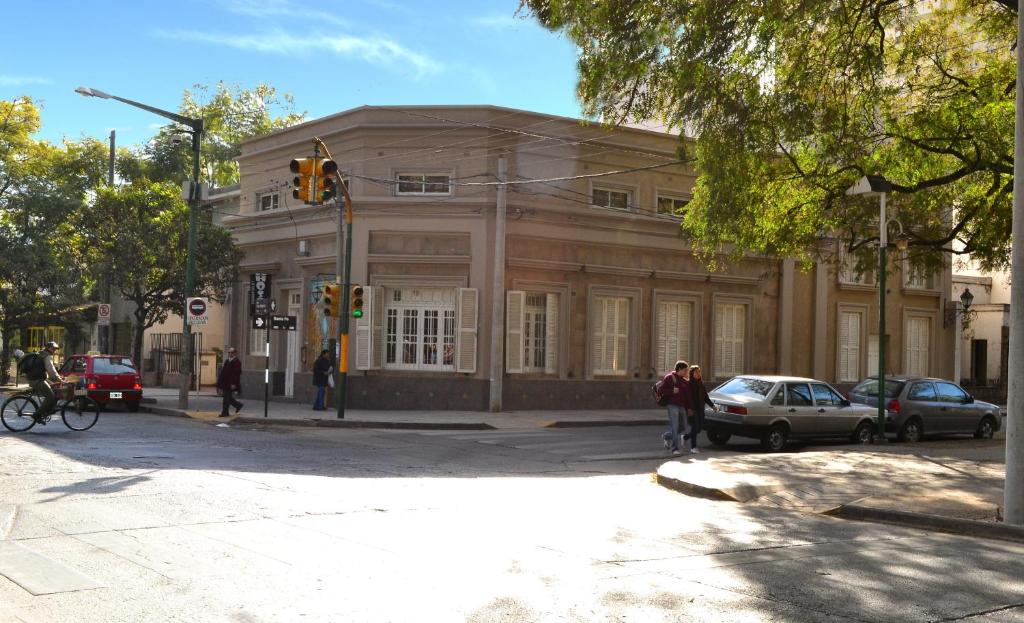 a building on a city street with a traffic light at La Salamanca in Salta