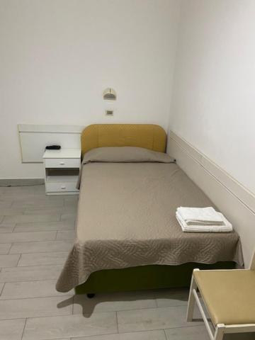 Postel nebo postele na pokoji v ubytování Hotel Primula