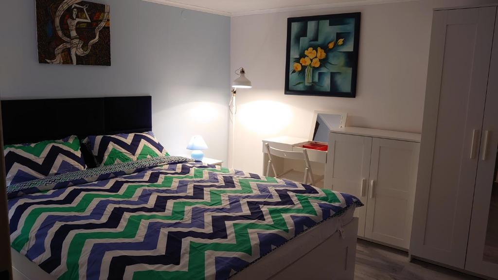 Posteľ alebo postele v izbe v ubytovaní ENKLAWA NAD KWISĄ [APARTAMENT 2]