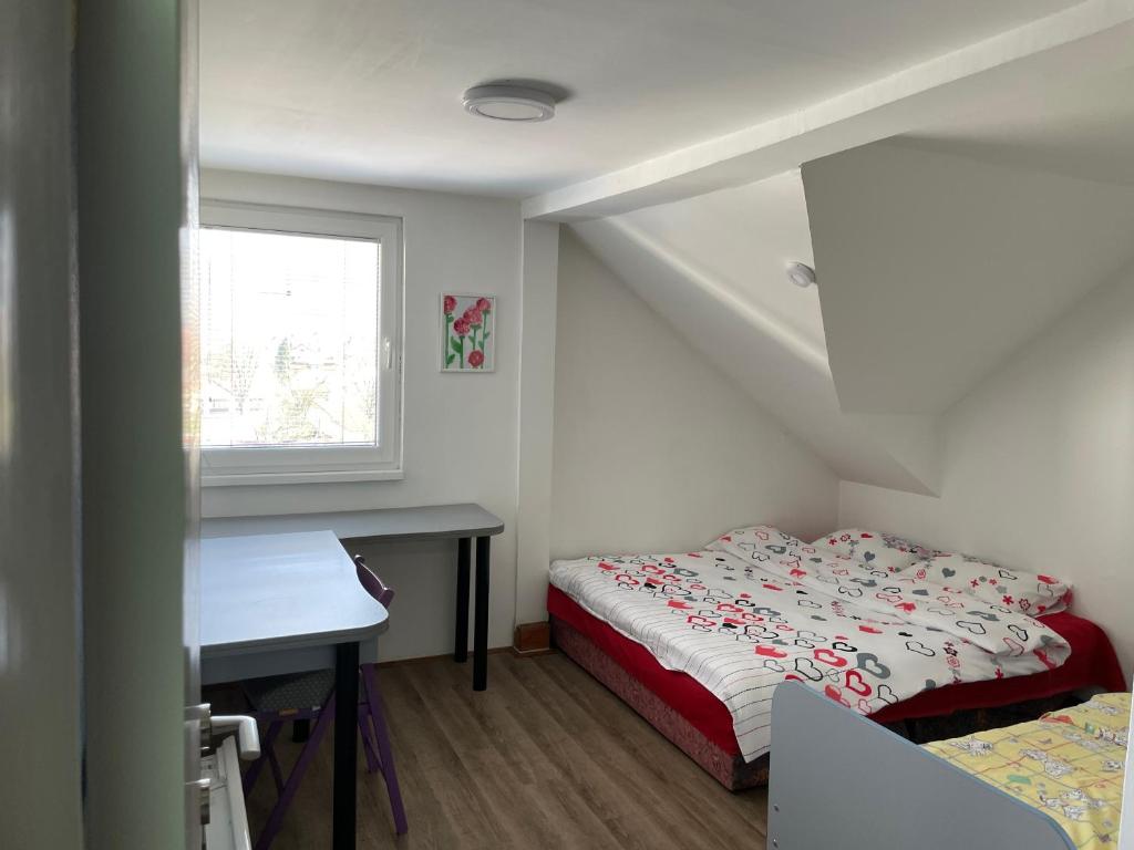 Postel nebo postele na pokoji v ubytování Delfin apartment