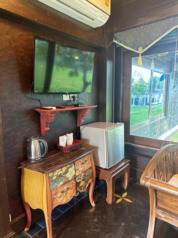 TV a/nebo společenská místnost v ubytování Bantunglom Resort
