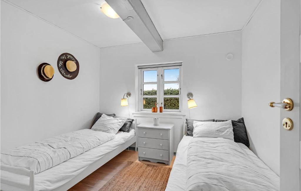 Postel nebo postele na pokoji v ubytování Cozy Home In Rudkøbing With Wifi