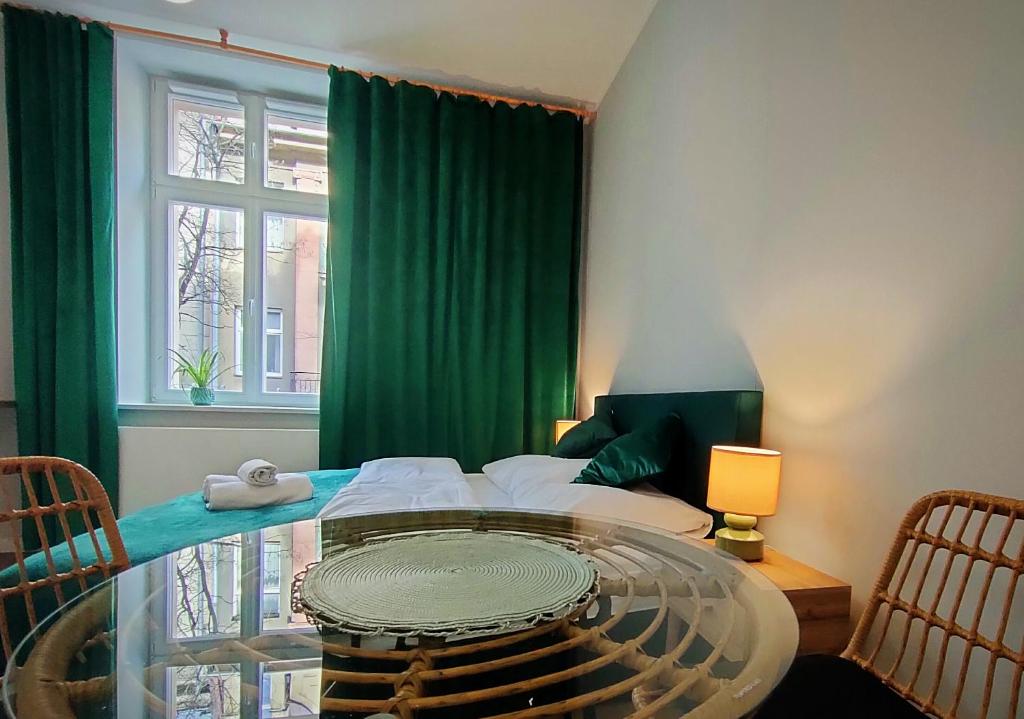 Postel nebo postele na pokoji v ubytování Hugo Eden Apartments