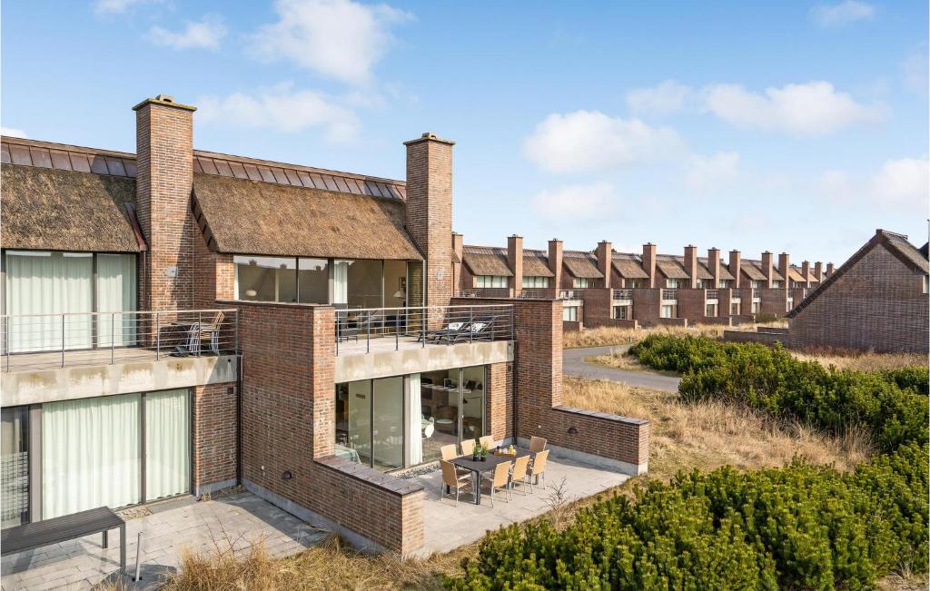 an aerial view of a brick building at 2 Bedroom Cozy Home In Rm in Sønderby
