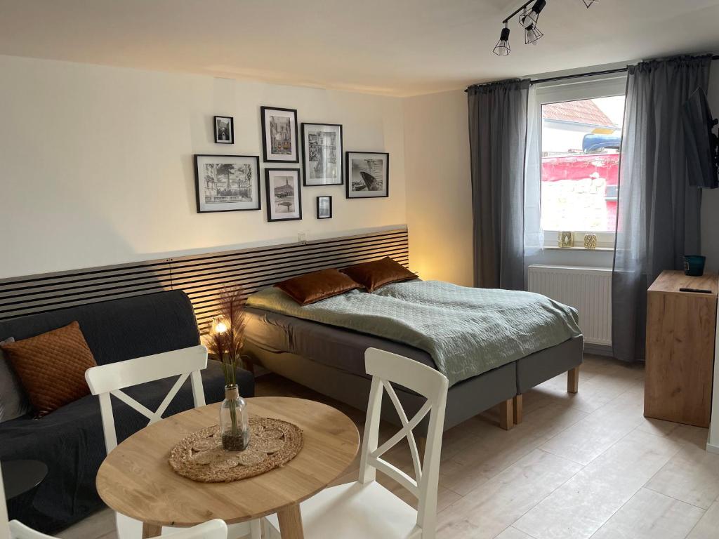 Katil atau katil-katil dalam bilik di Freigeist Apartments