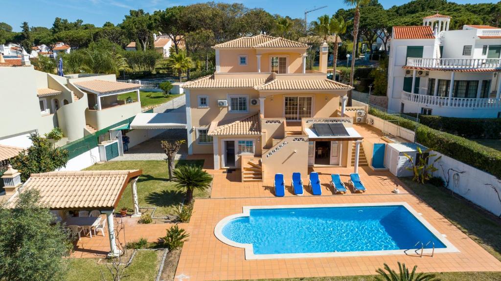 an aerial view of a house with a swimming pool at Amora Classic Villa in Vilamoura