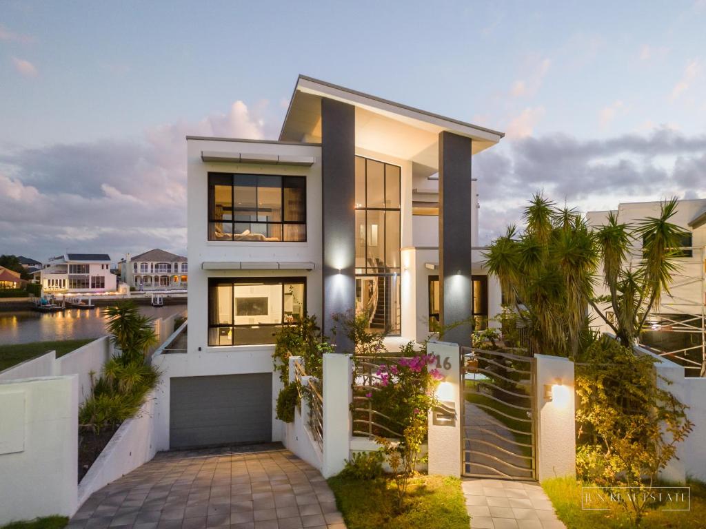 a house with a view of the water at stunning prestige residence in Gold Coast