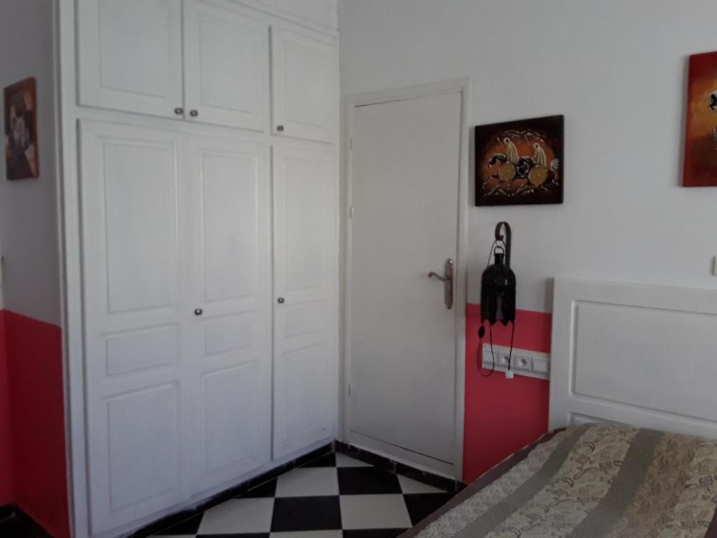Postel nebo postele na pokoji v ubytování Maison d'Hôte à Saïdia