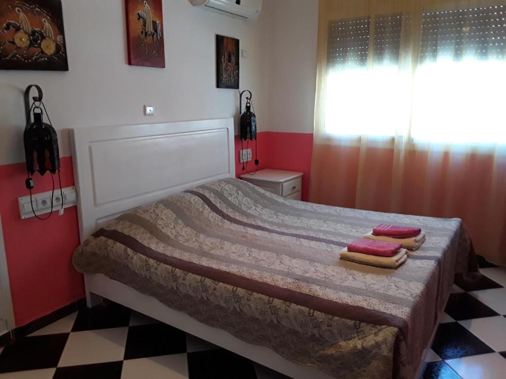 Postel nebo postele na pokoji v ubytování Maison d'Hôte à Saïdia