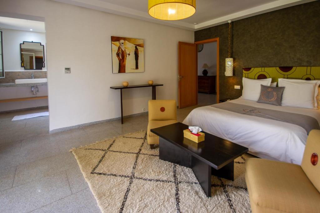 Postel nebo postele na pokoji v ubytování Villa Fima Kech