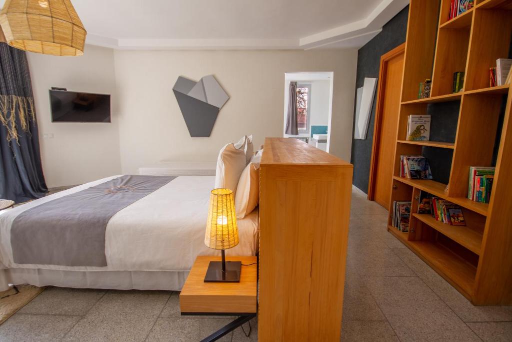 Postel nebo postele na pokoji v ubytování Villa Fima Kech