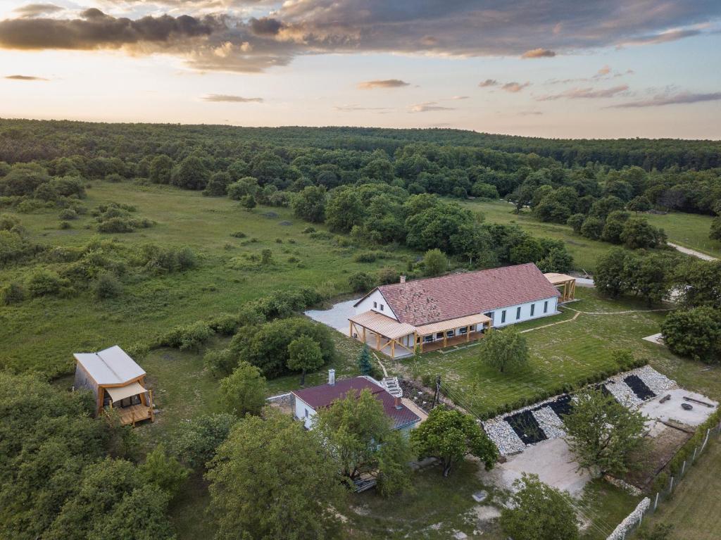 an aerial view of a house with a barn at PortusHome Vászoly in Vászoly