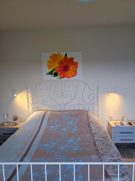 Postel nebo postele na pokoji v ubytování B&B Het Polderhof