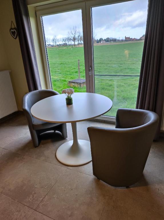 Posezení v ubytování B&B Het Polderhof