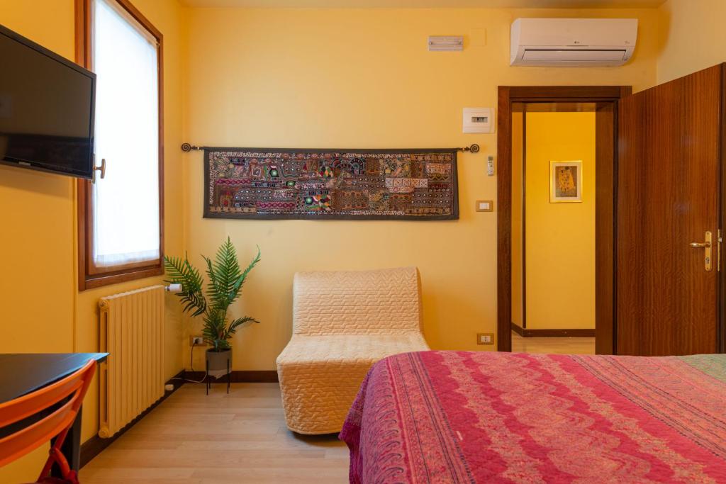 TV a/nebo společenská místnost v ubytování B&B Da Nina Venice