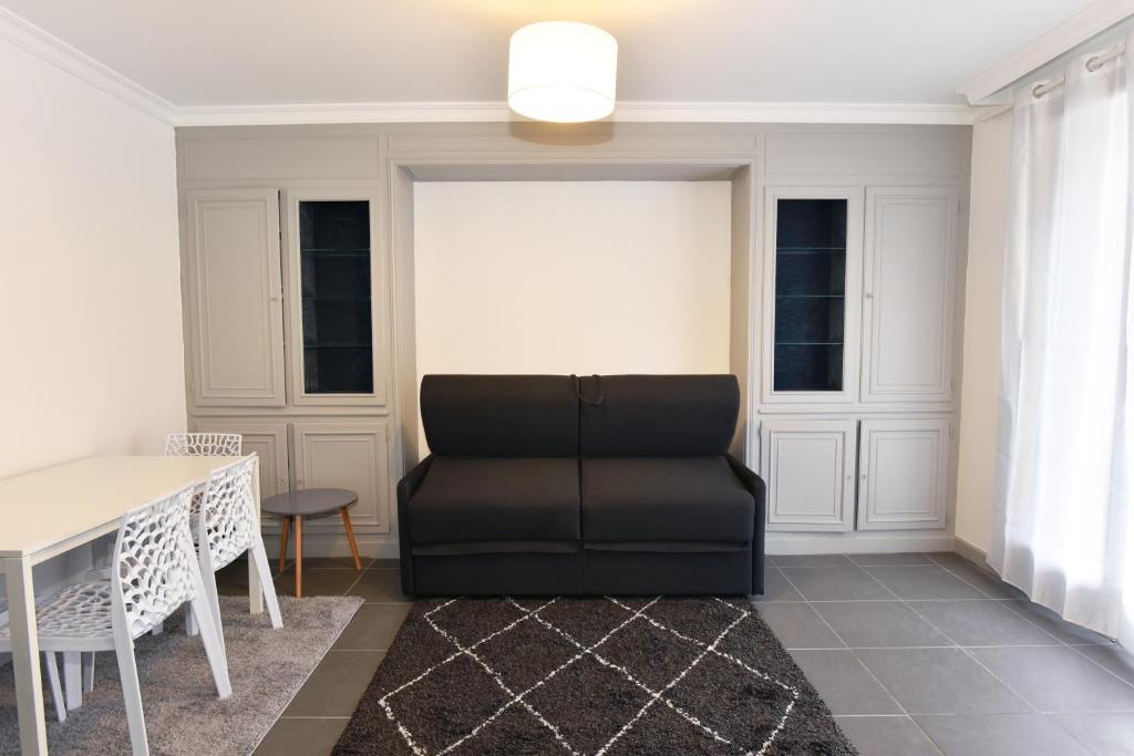 Posedenie v ubytovaní CONFORTABLE T2 AVEC PARKING PRIVE AU CENTRE de BRIVE