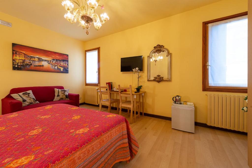 TV a/nebo společenská místnost v ubytování B&B Da Nina Venice