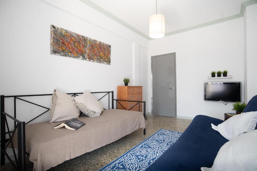 Posteľ alebo postele v izbe v ubytovaní Laonikos apartment Polychrono Villas beach bar