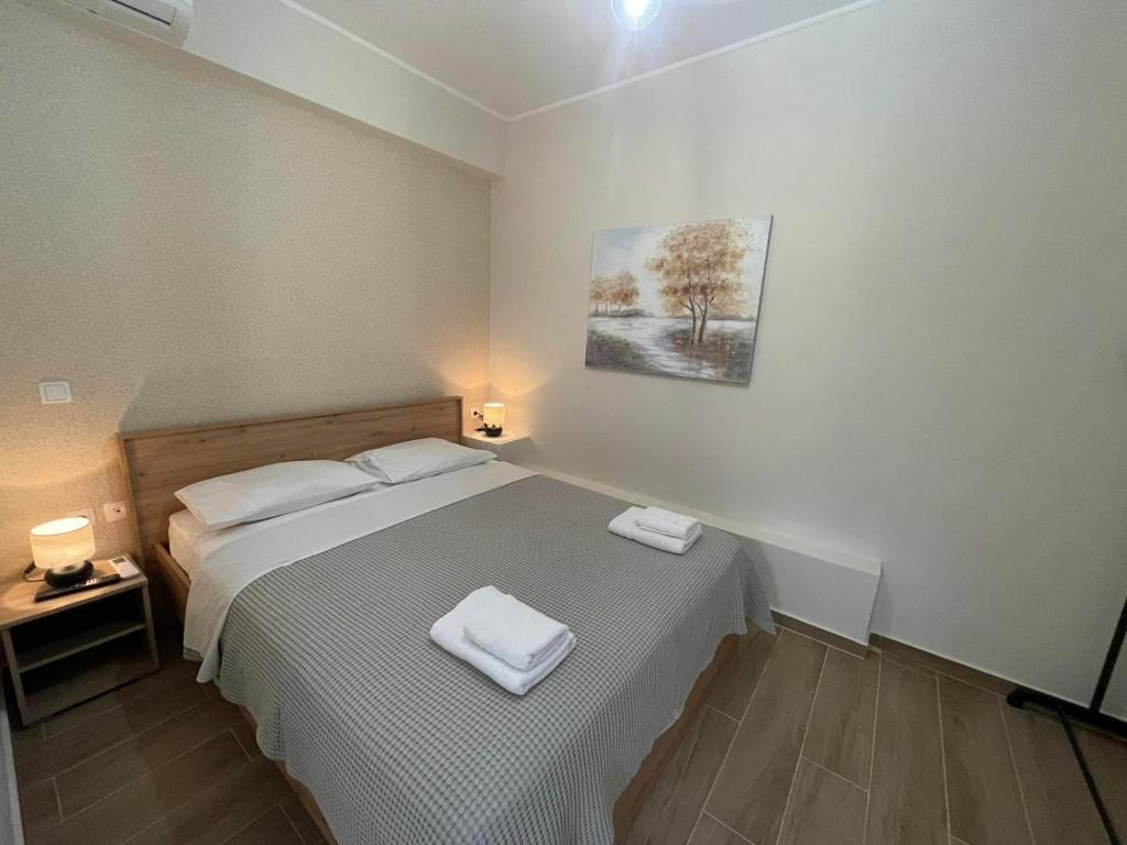 Posteľ alebo postele v izbe v ubytovaní AVR Airport Deluxe Suites 6 AIRPORT FREE SHUTLE