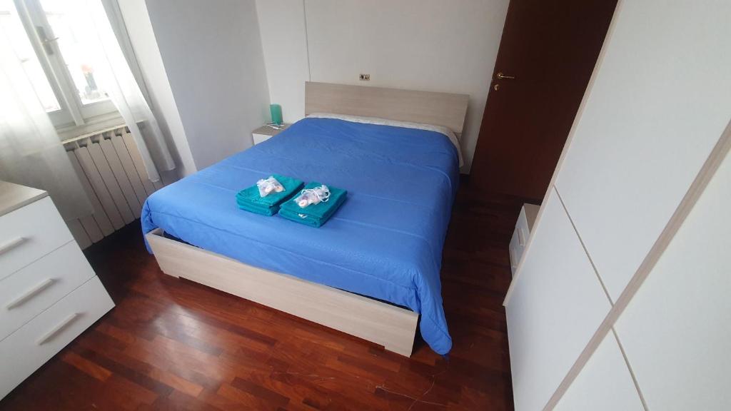 Postel nebo postele na pokoji v ubytování Vicolo Verri