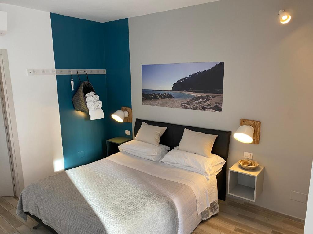 Postel nebo postele na pokoji v ubytování B&B 125Metri sul mare