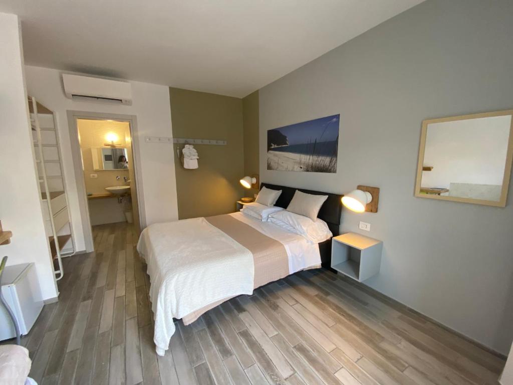 Postel nebo postele na pokoji v ubytování B&B 125Metri sul mare