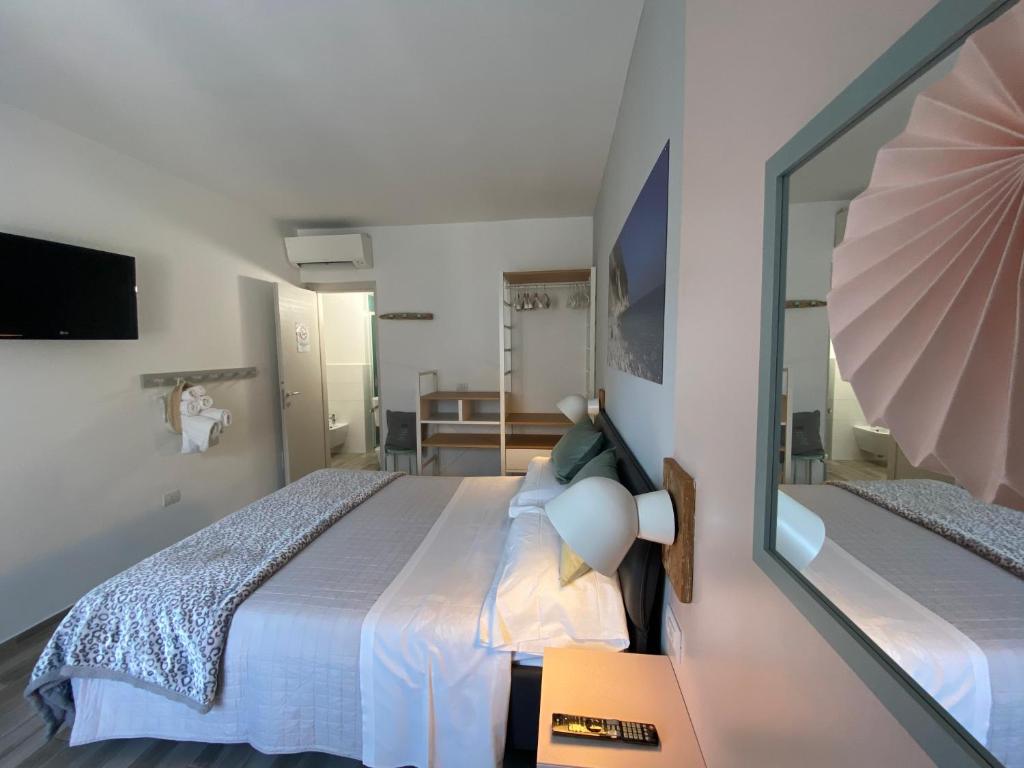 Postel nebo postele na pokoji v ubytování B&B 125Metri sul mare