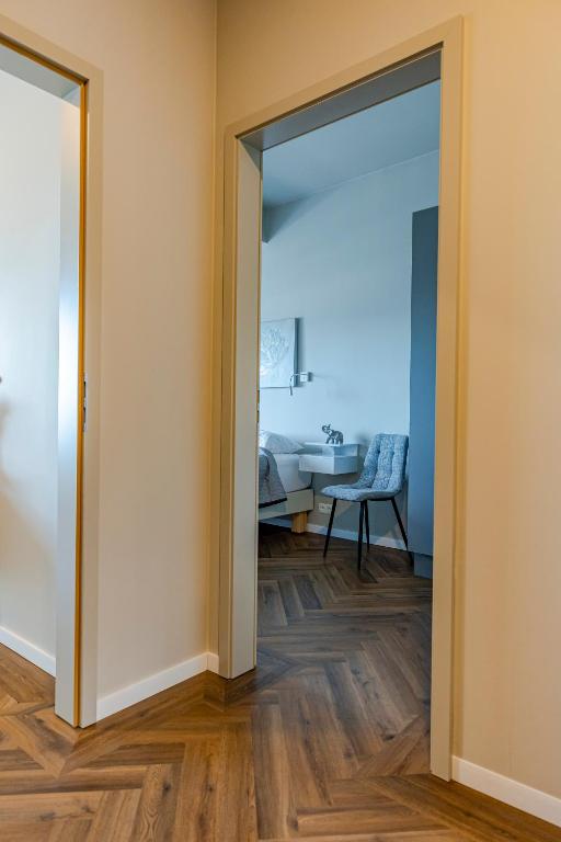 Postel nebo postele na pokoji v ubytování Iceland SJF Apartments - 401