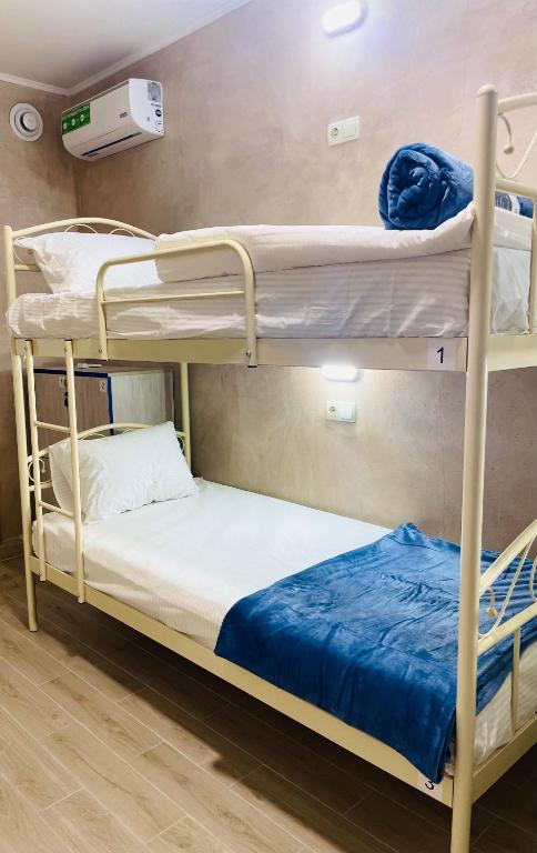 Postel nebo postele na pokoji v ubytování Hostel GARDEN St