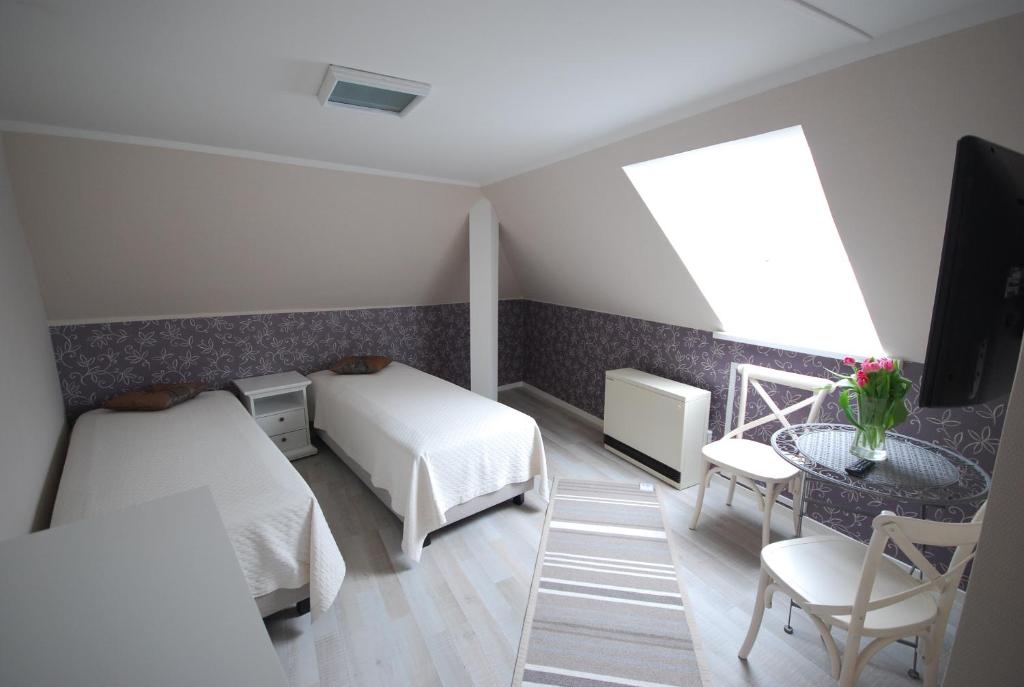 Postel nebo postele na pokoji v ubytování Suviste Guesthouse
