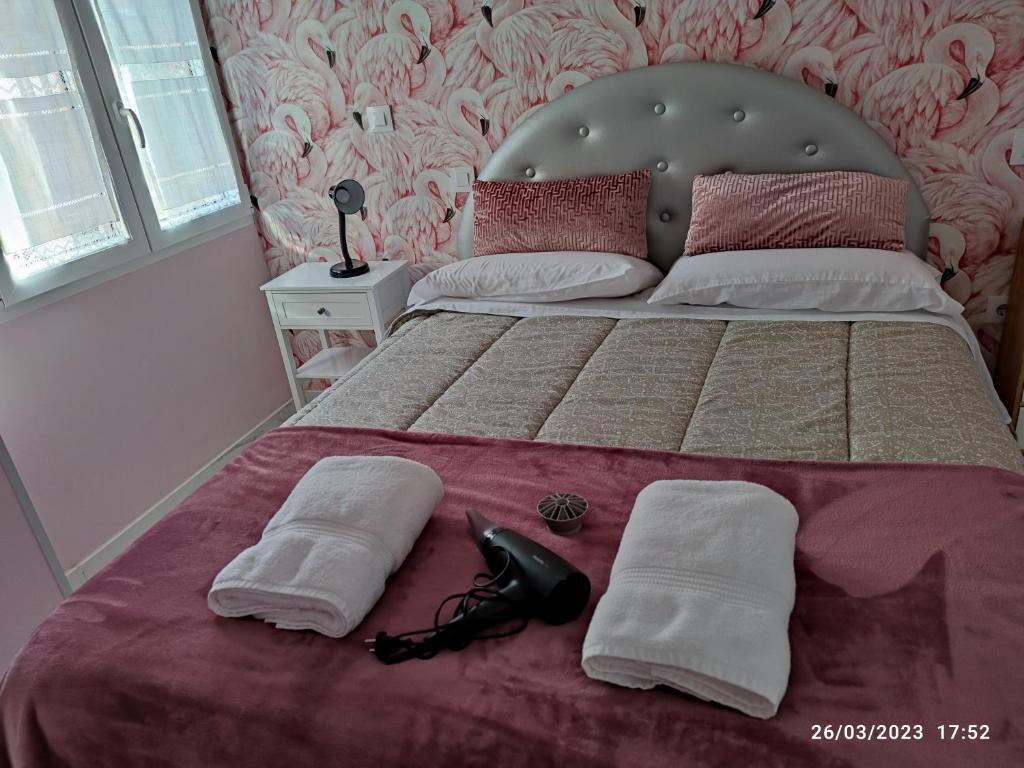 Łóżko lub łóżka w pokoju w obiekcie Apartamento Zona Playa y centro Ciudad
