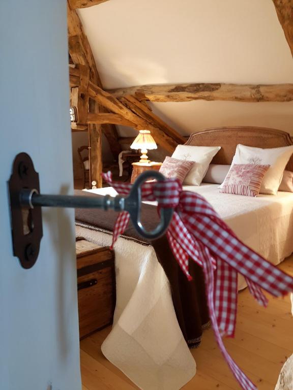 Postel nebo postele na pokoji v ubytování CAPMASIL Maison d'hôtes et Spa