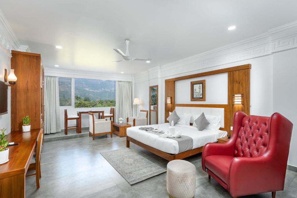 Postel nebo postele na pokoji v ubytování HOTEL WHITE HOUSE, Munnar