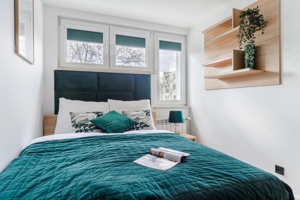 Posteľ alebo postele v izbe v ubytovaní P&O Apartments Sobieskiego - Mokotów