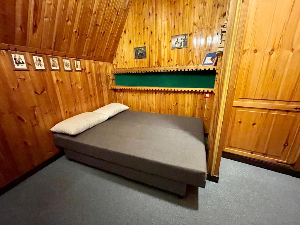 Postel nebo postele na pokoji v ubytování Appartamento Il Riccio Terminillo