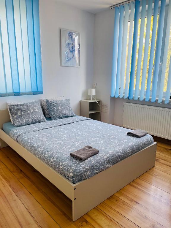 Posteľ alebo postele v izbe v ubytovaní Pokoje Slawin