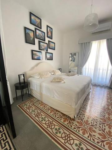 Postel nebo postele na pokoji v ubytování Vittorio Emanuele Top Suite