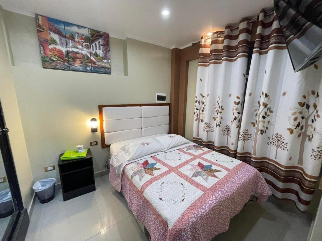 Postel nebo postele na pokoji v ubytování HOSPEDAJE SAMAY WASI (AYACUCHO)