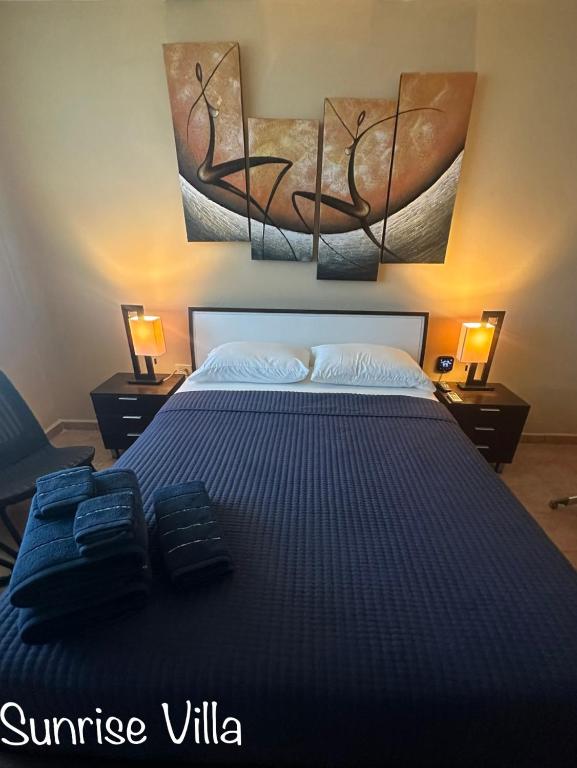 Postel nebo postele na pokoji v ubytování Sunrise Villa